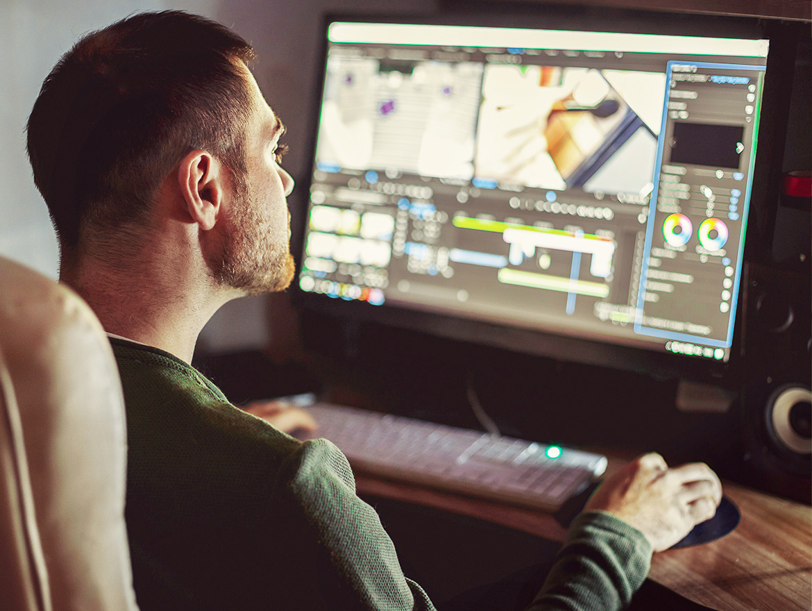 Picture of man using AWS services for his work