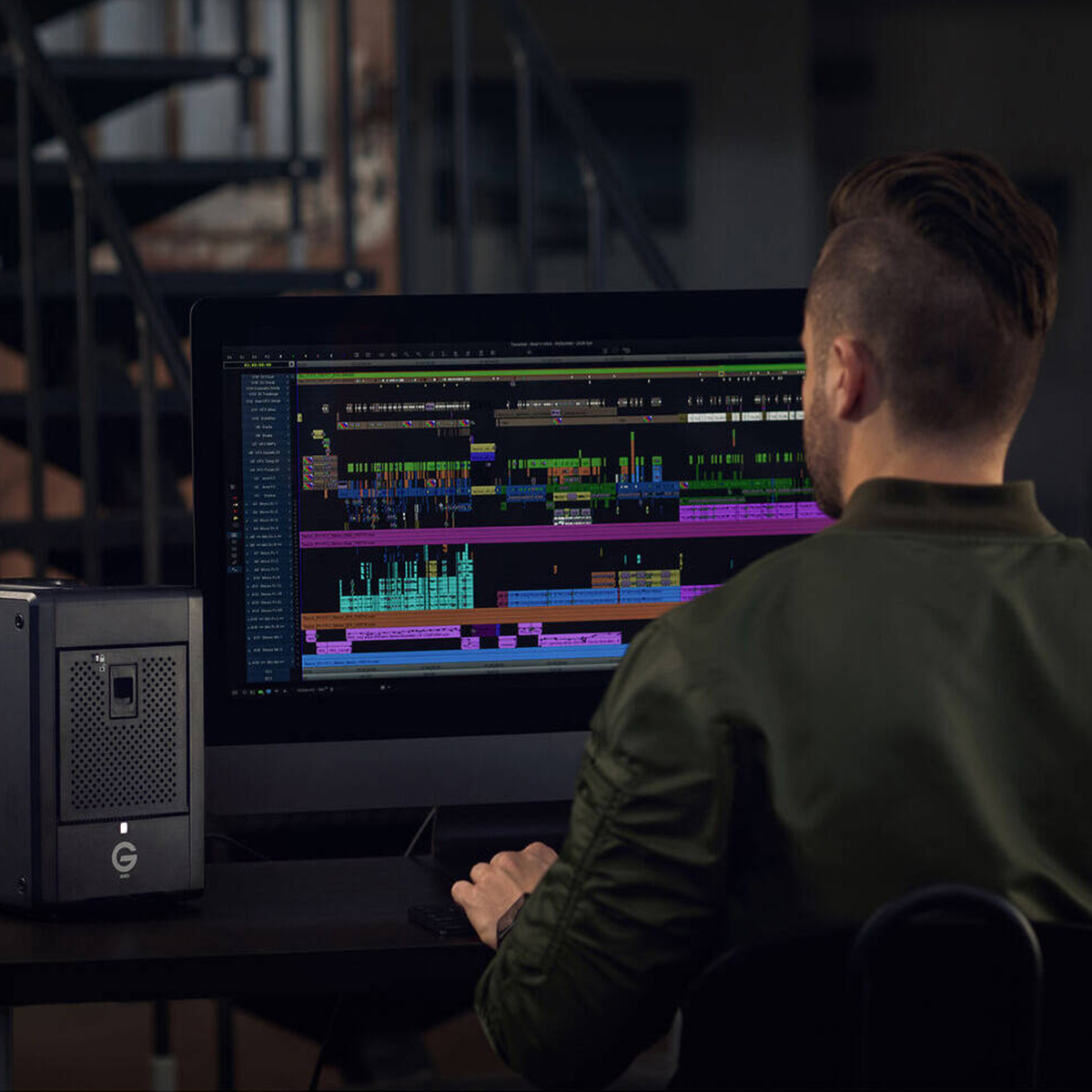 Picture of man in the tv production industry using a SanDisk Professional hard drive