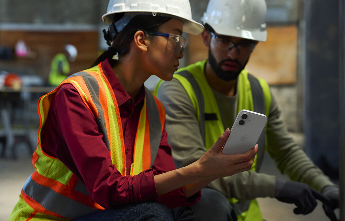 Field service workers using an iPhone