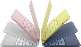 MacBook Neo laptops in silver, blush, citrus and indigo colours, slightly open and arranged in an arch formation