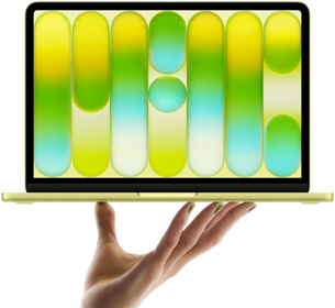 MacBook Neo in citrus colour, balanced on fingertips of open hand, screen displaying colourful abstract pattern