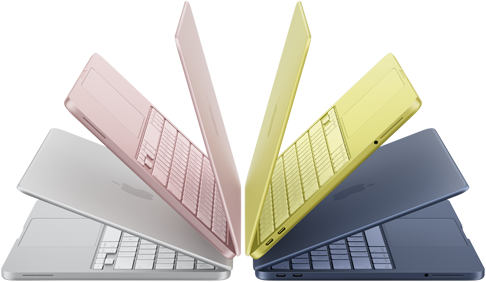 MacBook Neo laptops in silver, blush, citrus and indigo colours, slightly open and arranged in an arch formation