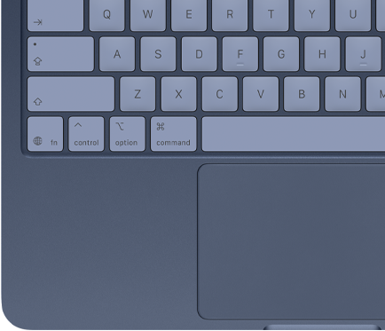 A top-down view of MacBook Neo in indigo, with colour-coordinated keycaps and Multi-Touch trackpad visible
