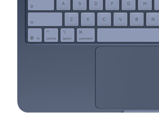 A top-down view of MacBook Neo in indigo, with colour-coordinated keycaps and Multi-Touch trackpad visible